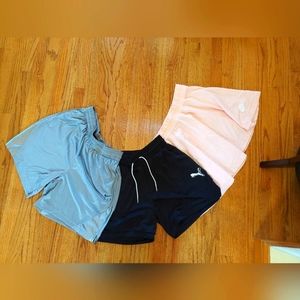 Two Pairs of Athletic Shorts and a Skirt